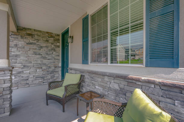istock Porch with armchairs and windows with reflections 1126332356