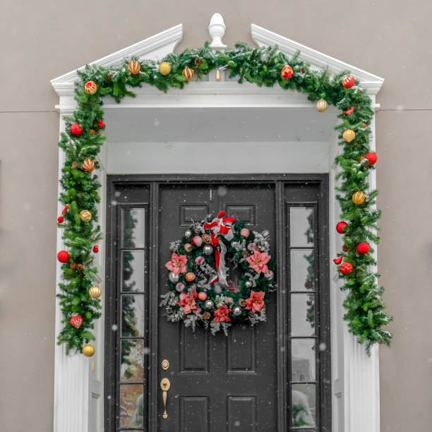 istock Glass paned front door with garland and wreath 1126332380