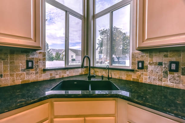istock Polished kitchen interior of home with scenic view 1126335545