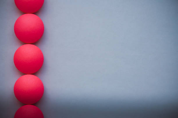 istock Red pills in a row on a blue background. 1126335805