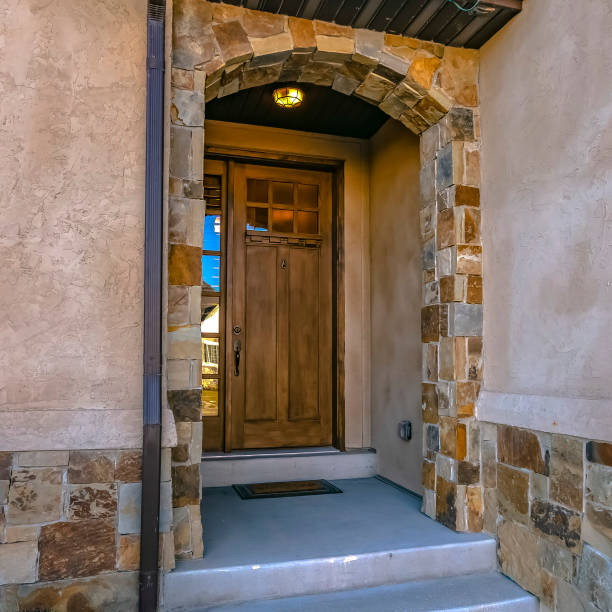 istock Home with arched entryway and brown door in Utah 1126337583