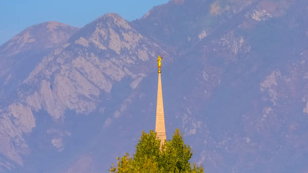 Church spire in Daybreak Utah with statue on top