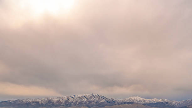 istock Vast cloudy sky over Lowe Peak in Cedar Valley 1126339594