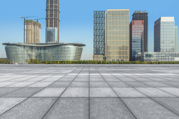 istock Empty pavement and modern building in city 1126339751