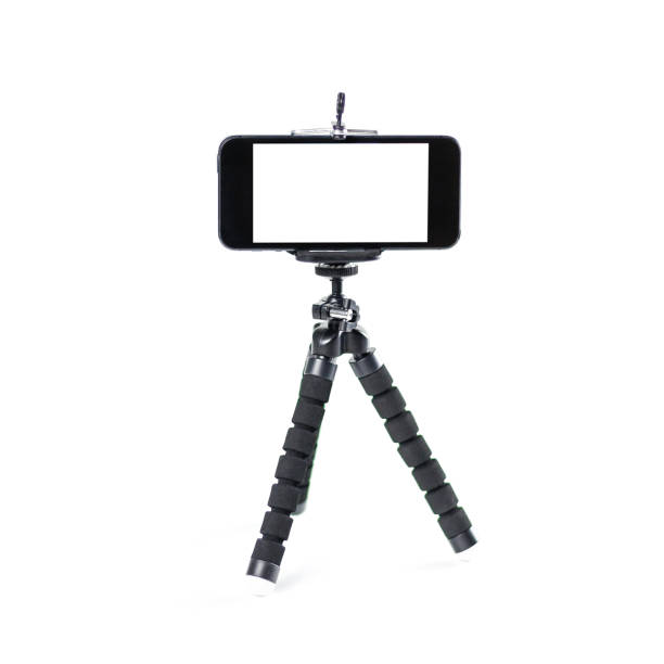 istock The phone on the tripod. Close up. Isolated on white background 1126343799