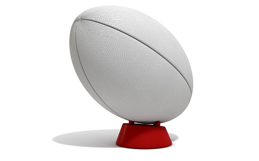 A plain white textured rugby ball on a kicking tee on a isolated white background - 3D render