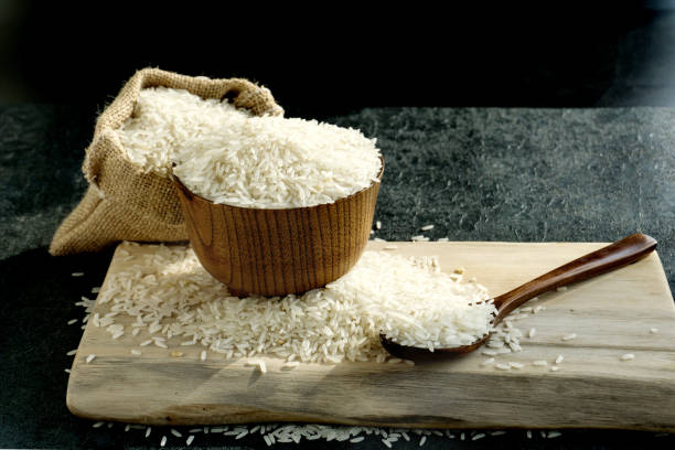 istock rice in a wooden bowl 1126345214