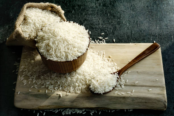 istock rice in a wooden bowl 1126345252