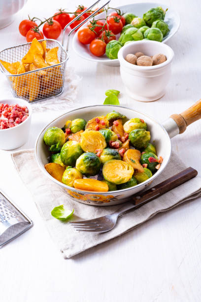 istock Roasted Brussels sprouts with honey and sesame from the oven 1126349517