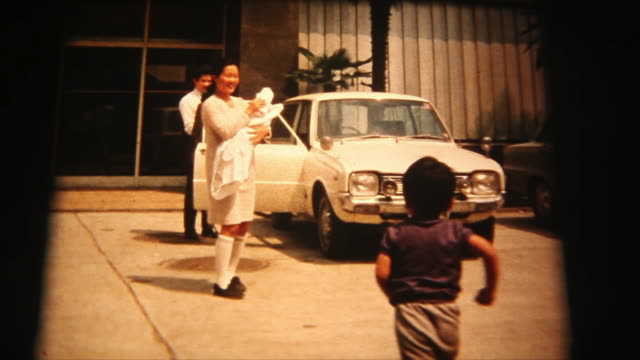 60's 8mm footage - Mother and newborn baby going to home