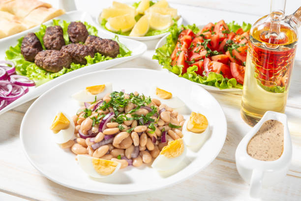 istock Oriental piyaz bean salad with meatballs. 1126355292