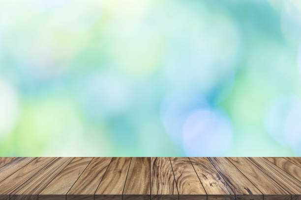 istock Top wood table perspective on bokeh blurred background. 1126367177