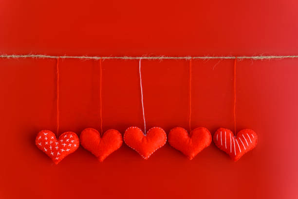 istock Colorful paper hearts on line as a gift for Valentine's Day. 1126367946