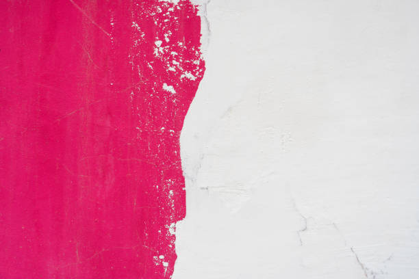 istock texture of the wall is half white, half red. 1126368612