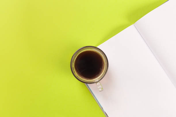 istock magazine mock up with coffee on green background 1126369594
