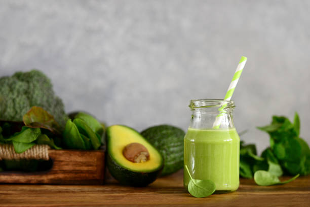 istock Avocado base green smoothies with vegetable greenery 1126369688