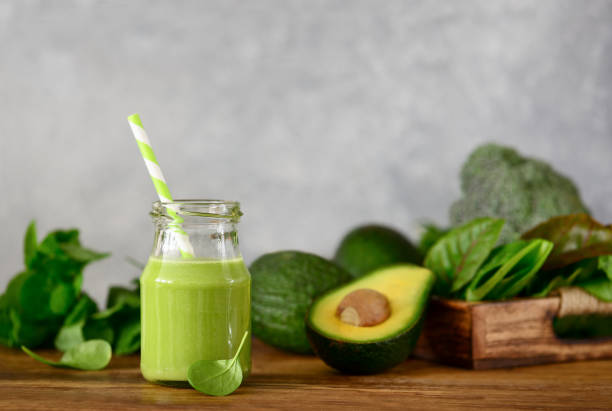 istock Avocado base green smoothies with vegetable greenery 1126369691