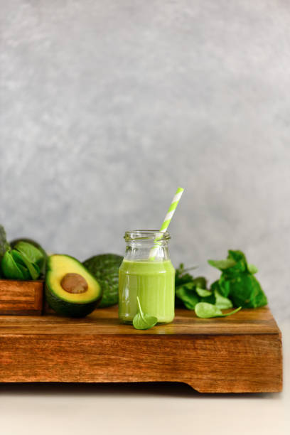 istock Avocado base green smoothies with vegetable greenery 1126369693