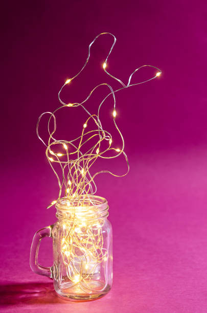 istock Light of small bulb in glass. 1126371883