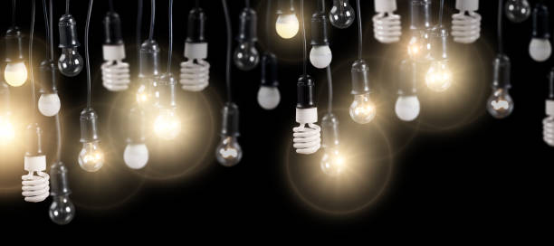 istock large group of electric lamps on black 1126372542