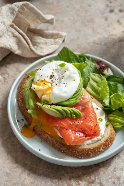 istock Salmon, avocado and poached egg sandwich 1126375329