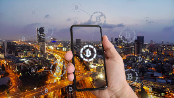 istock Bitcoin crypto currency blockchain mobile phone network security e-commerce modern city technology 1126375555