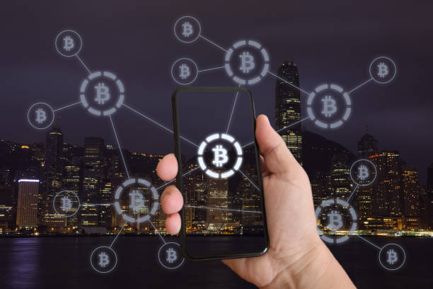 istock Bitcoin crypto currency blockchain mobile phone network security e-commerce modern city technology 1126375947