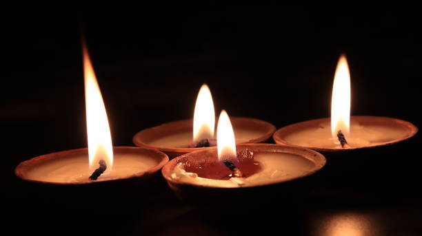 istock Four candles or butter lamps 1126377040