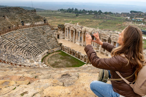 istock Woman Visiting the Ancient Amphitheater in Myra (Demre), Turkey 1126377421