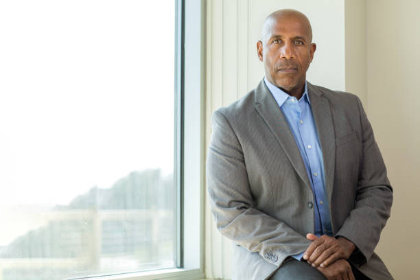 istock Happy mature African American man at work. 1126378169