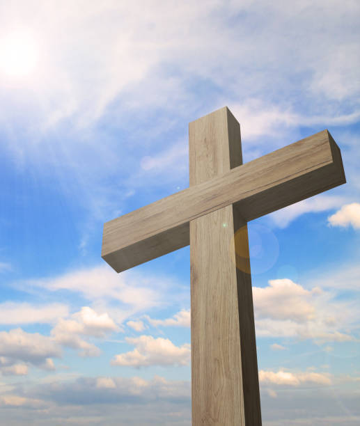 istock The cross of jesus and cloudful blue sky 1126379637