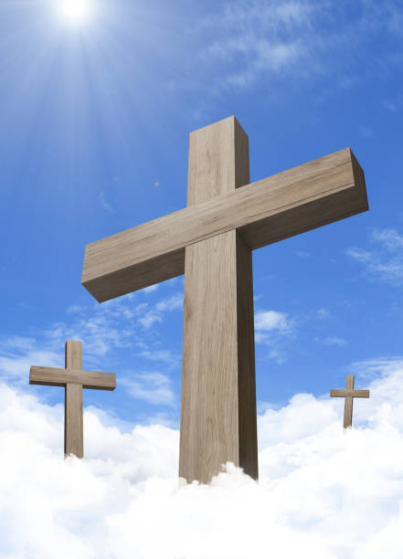 istock Wooden crosses in cloudful blue sky 1126380164