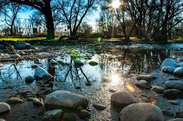 The sunrise in the river with a clean water