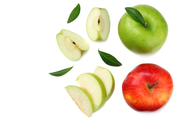 istock green and red apples with slices isolated on white background. top view 1126386937