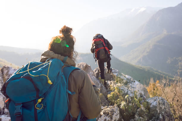 istock Young Couple Hiking in Mountain 1126387179