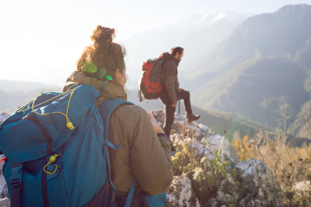 istock Young Couple Hiking in Mountain 1126387182