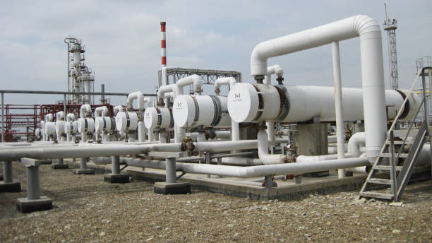 istock Heat exchangers at oil refinery. 1126387186