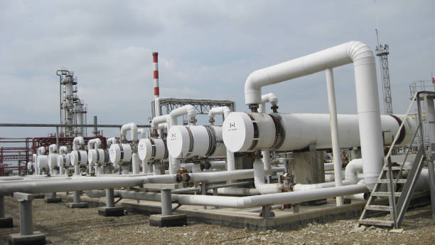 istock Heat exchangers at oil refinery. 1126387188