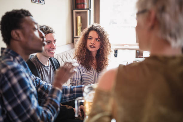 istock Group of the friends having fun in the pub 1126387701