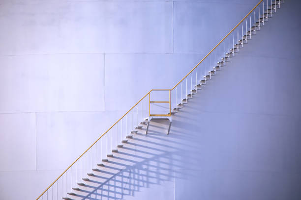 istock Low Angle View Of Staircase Against White Wall 1126388808