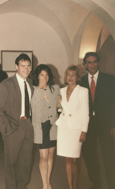 istock Two young couples at a wedding party in 1968 1126390124