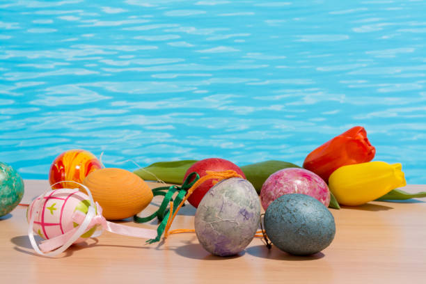 istock Easter in pool, wellness and relax. Eggs and water background for party and spa 1126390471
