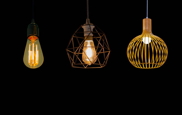 istock Isolated Round light bulbs  for illumination on a black background 1126390609