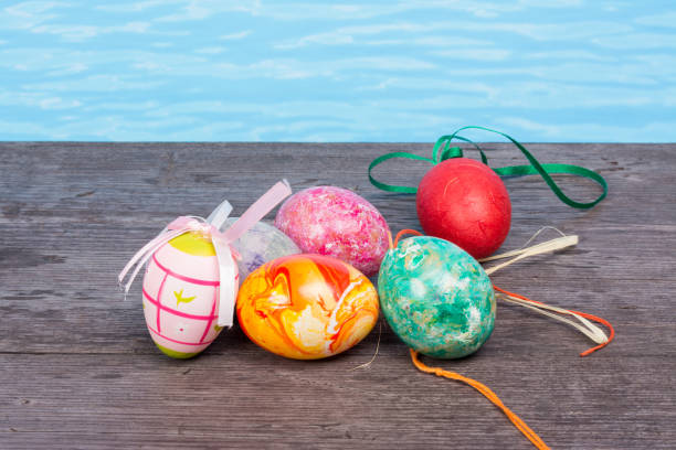 istock Easter in pool, wellness and relax. Eggs and water background for party and spa 1126390648