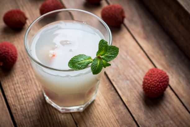 istock Old fahioned lychee cocktail on the rustic background 1126391720