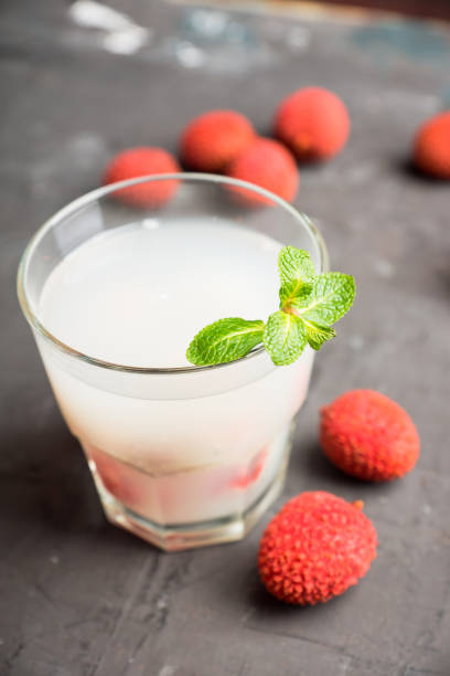 istock Old fahioned lychee cocktail on the rustic background 1126391740