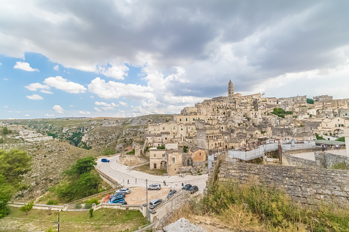 panoramic view of typical stones Sassi di Matera and church of Matera 2019 under blue sky with clouds,capital of europe culture 2019