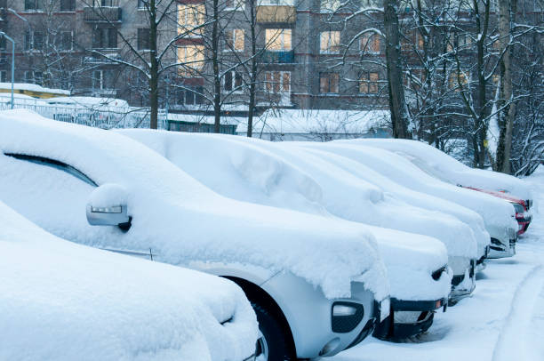 istock Cars under snow. Snowy winter. 1126395492