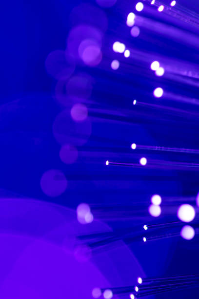 istock Fiber optics abstract background with defocused lights (blue) 1126397922