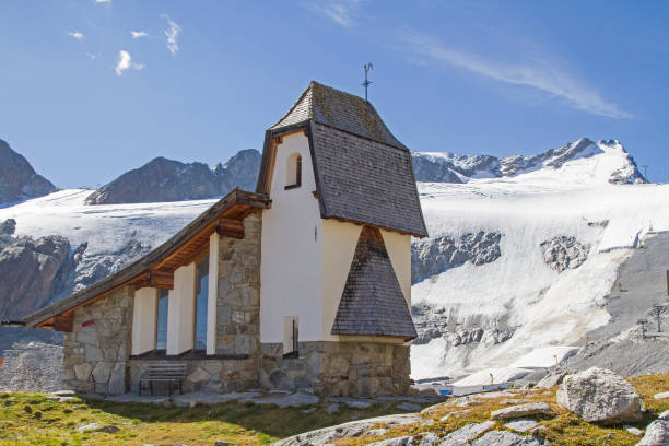 mountain church not far from the Rettenbachferner The mountain church not far from the Rettenbachferner was built in a grandiose high alpine landscape rettenbach glacier stock pictures, royalty-free photos & images